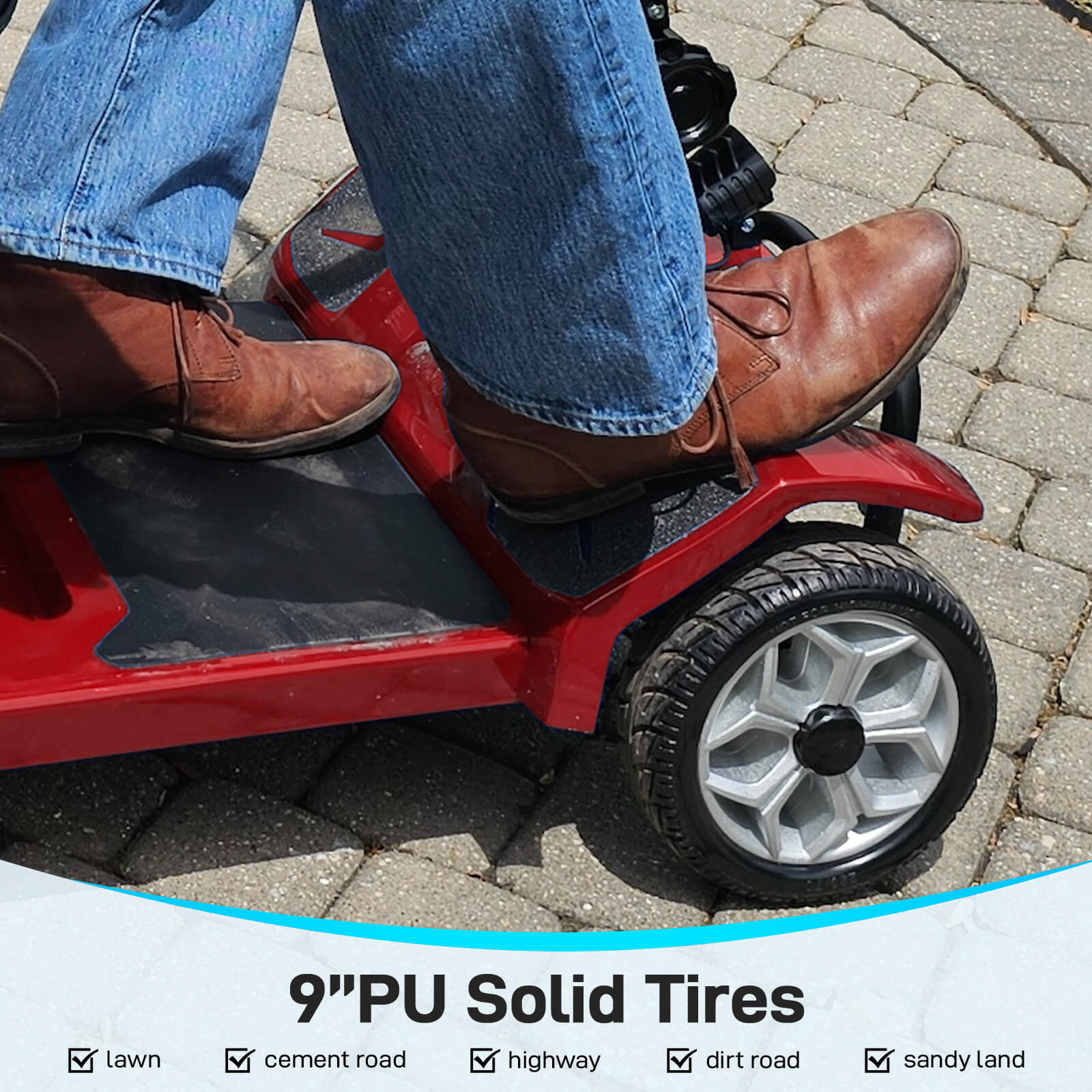 Red scooter with 9” PU solid tires on a paved surface, showing feet wearing brown shoes and blue jeans.