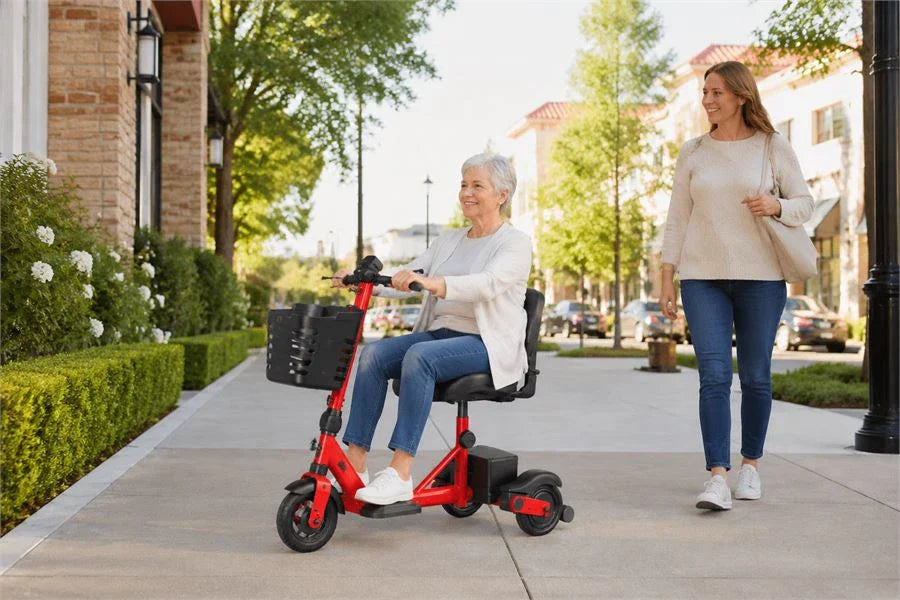 Senior rider safely operating a 3-wheel mobility scooter on a smooth paved path